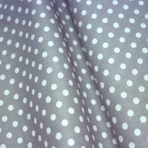 Tela de topos blancos con fondo gris. Stof Fabrics. Color 680