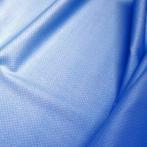 Tela de topos blancos con fondo azul. Stof Fabrics. Color 886