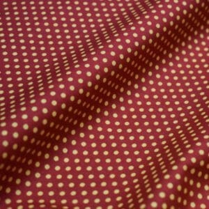 Tela de topos sobre fondo naranja. COATS. PWZZ007. TANGO