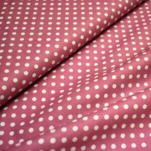 Tela de topos blancos con fondo rosa. Stof Fabrics. Color 864