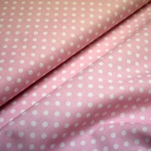 Tela de topos blancos con fondo rosa claro. Stof Fabrics