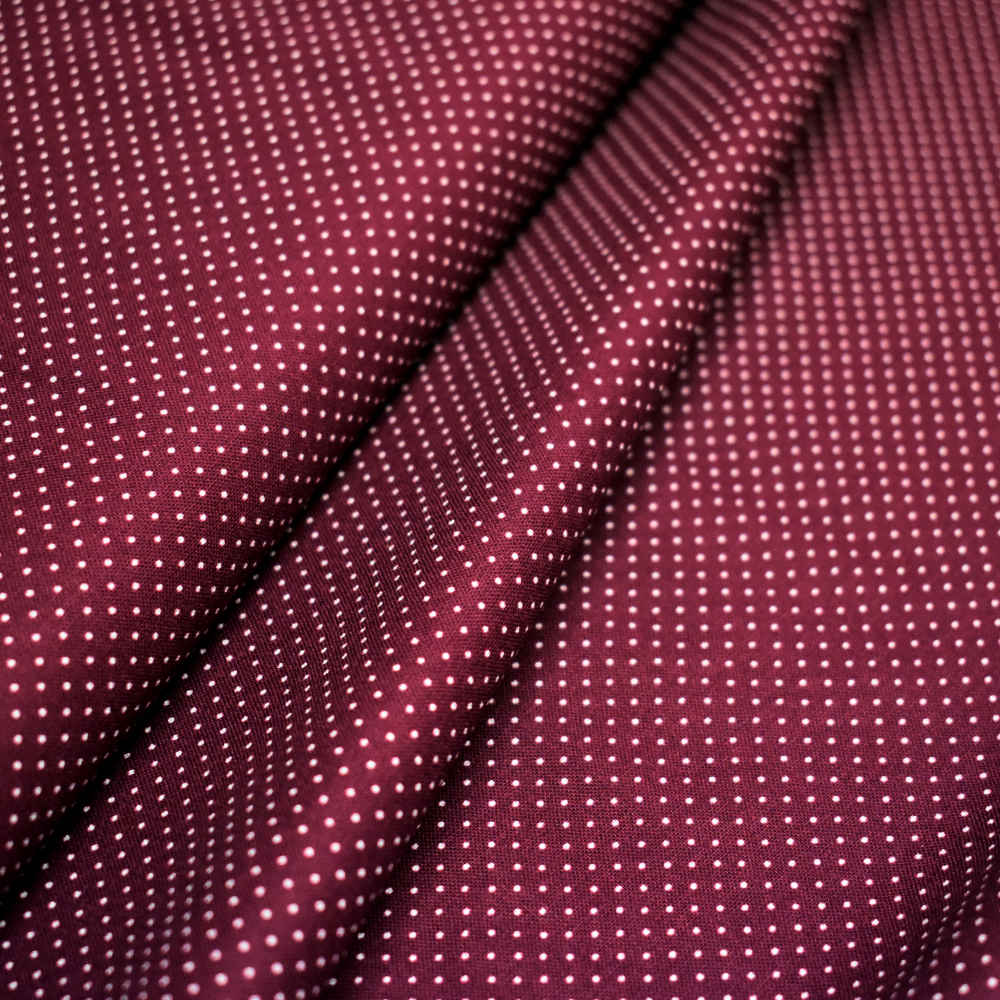 Tela de topos blancos con fondo berenjena. Stof Fabrics. Color 877