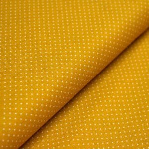 Tela de topos blancos con fondo mostaza. Stof Fabrics. Color 883